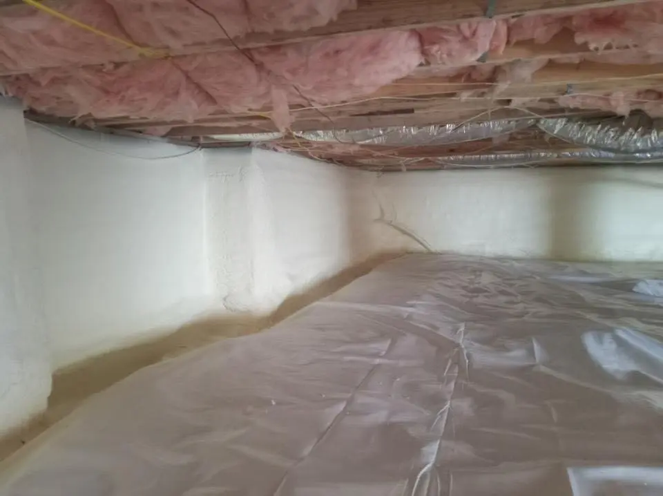 Crawl space encapsulation with closed-cell spray foam for Commercial Roof Restoration in Monroeville